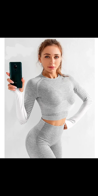 Stylish gray activewear set with cropped top and high-waisted leggings featured in image