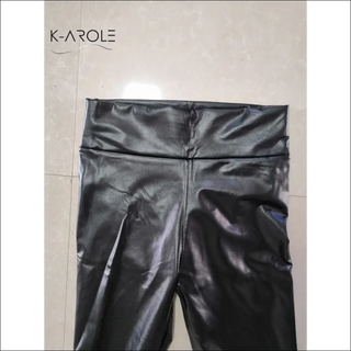 Sleek, black PU leather leggings from K-AROLE, showcasing a high-waisted, figure-flattering design.