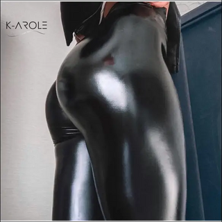 Stylish black leather leggings displayed prominently in the image. The K-AROLE brand name is showcased, highlighting the premium quality and fashion-forward design of this product.