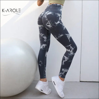 Seamless yoga tights with bold marble print design, offering comfort and style from K-AROLE, the women's fashion sneaker brand.
