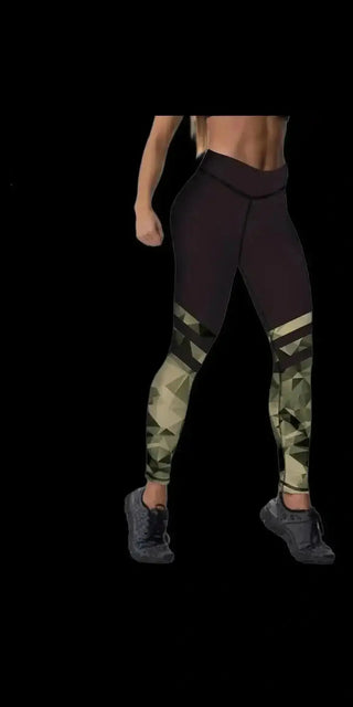 Stylish women's leggings with a bold camouflage pattern and sporty black panels, designed for active wear and fashionable comfort.