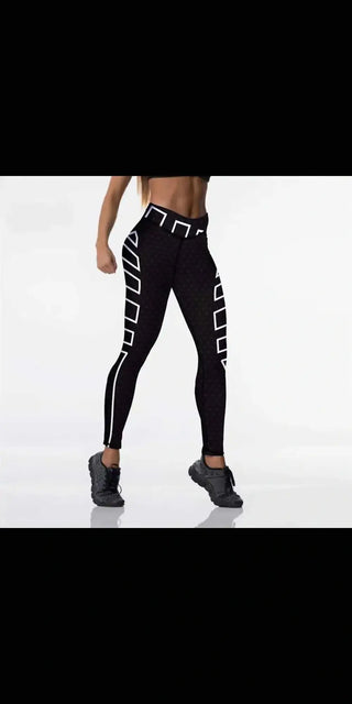 Stylish women's digital print leggings in black and white, showcased on a model's lower body. The leggings feature a sleek, modern design with geometric patterns, providing both comfort and fashion-forward appeal.