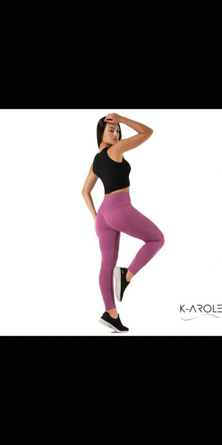 Sleek and sporty K-AROLE sports leggings in vibrant pink, ideal for yoga, pilates, and other fitness activities.