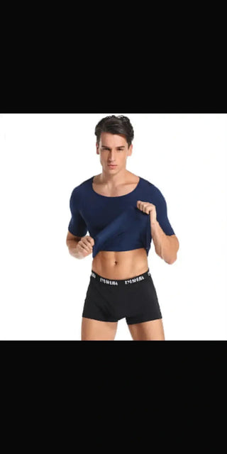 Sleek men's compression t-shirt showcased on model with athletic build. K-AROLE offers trendy, comfortable athleisure wear to elevate your style.