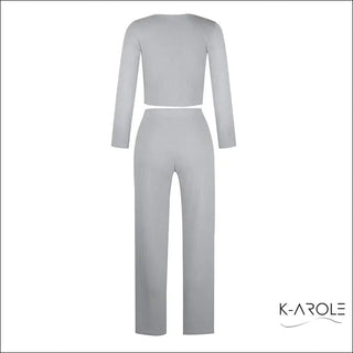 Trendy women's long sleeve set with a crop top and matching pants in a chic grey color, displayed on a plain background in the K-AROLE product image.