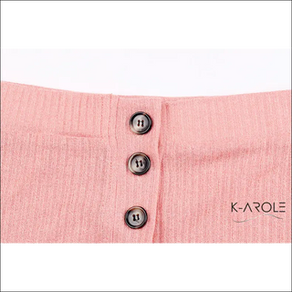 Women's long sleeve set with button closure and K-AROLE logo on the bottom, displayed on a plain white background.