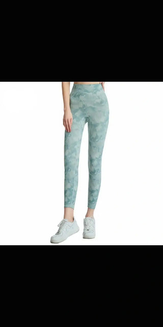 Stylish marble-patterned leggings from K-AROLE, featuring a high-waisted design for a sleek, comfortable fit.