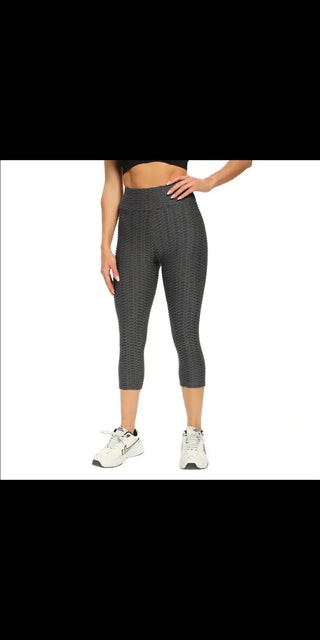 Stylish women's yoga pants in gray with a breathable, sweat-wicking design for an active lifestyle.